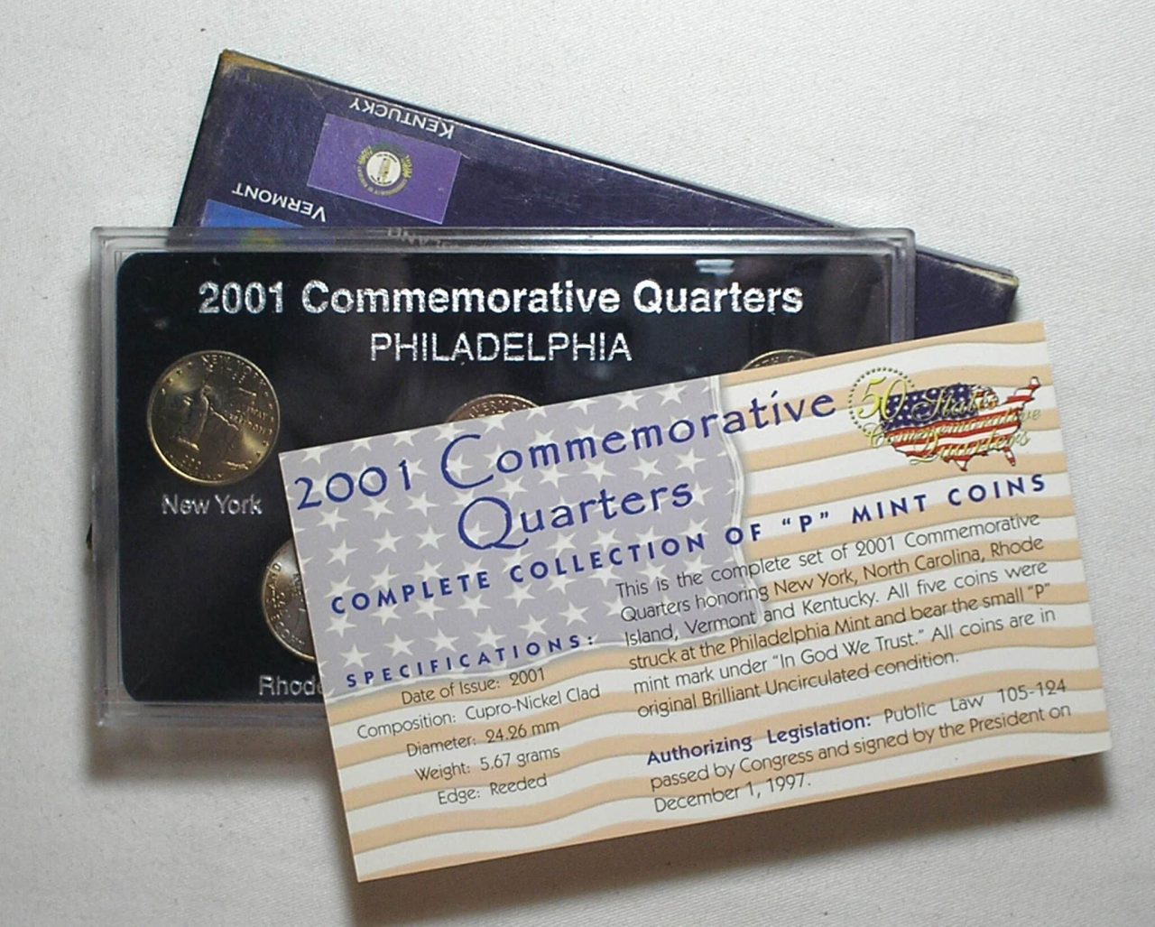 | Casa do Colecionador Usa) Estojo 25 Cents - 2001-P " Comemorativas Quartes Estados 5 Moedas / Uncirculated / cod. ems.2