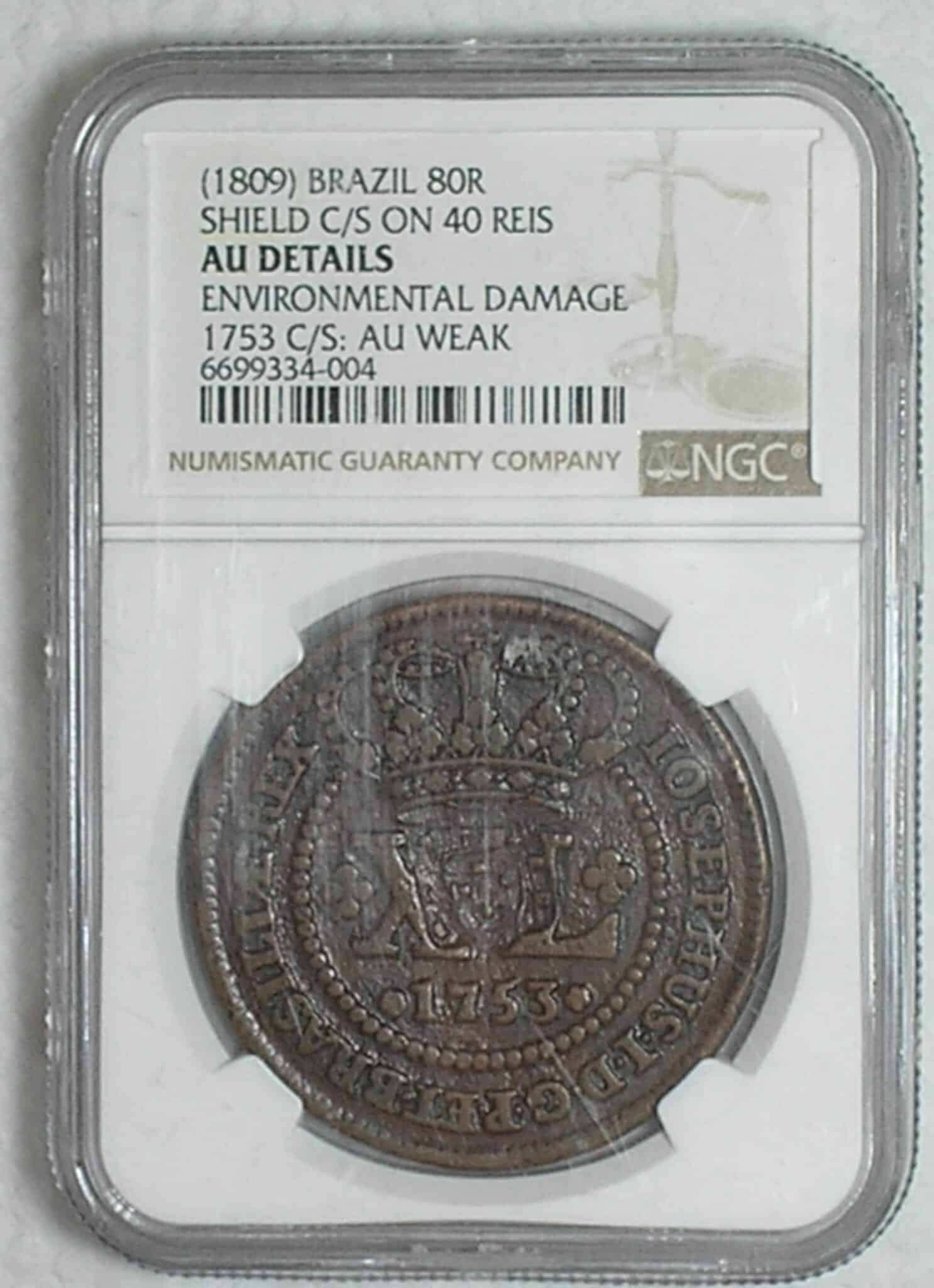 | Casa do Colecionador Xl Reis 1753 46 Perolas Data Floroes Verticais Escudete Colonia De Iosephus I Cobre Soberba Au Weak Graduada Pela Ngc Rara Nesse Estado Cod300