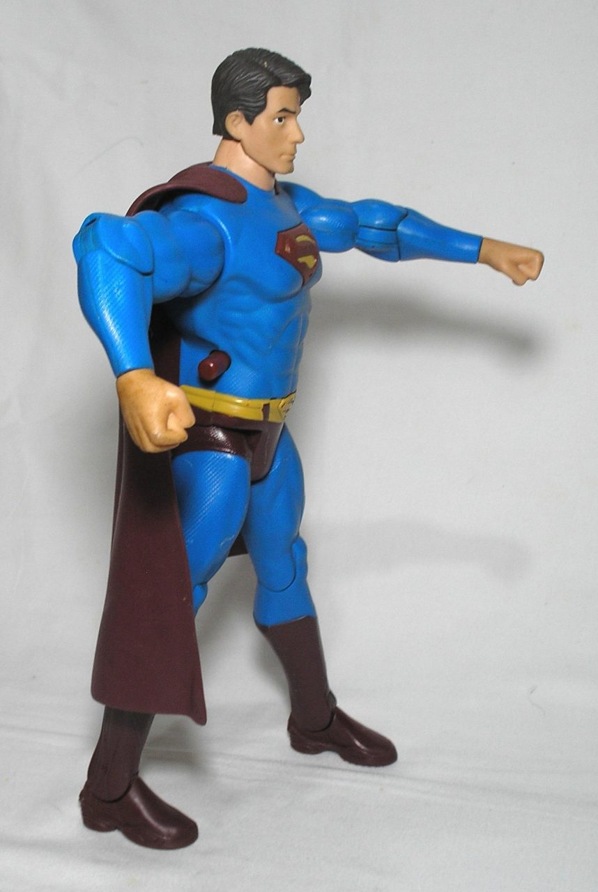 | Casa do Colecionador Boneco - Super Homem, Todo Articulado e com função de botão para articular braços em movimentos, fica em pé, Tamanho 30 cm altura / Original Mattel capa marron