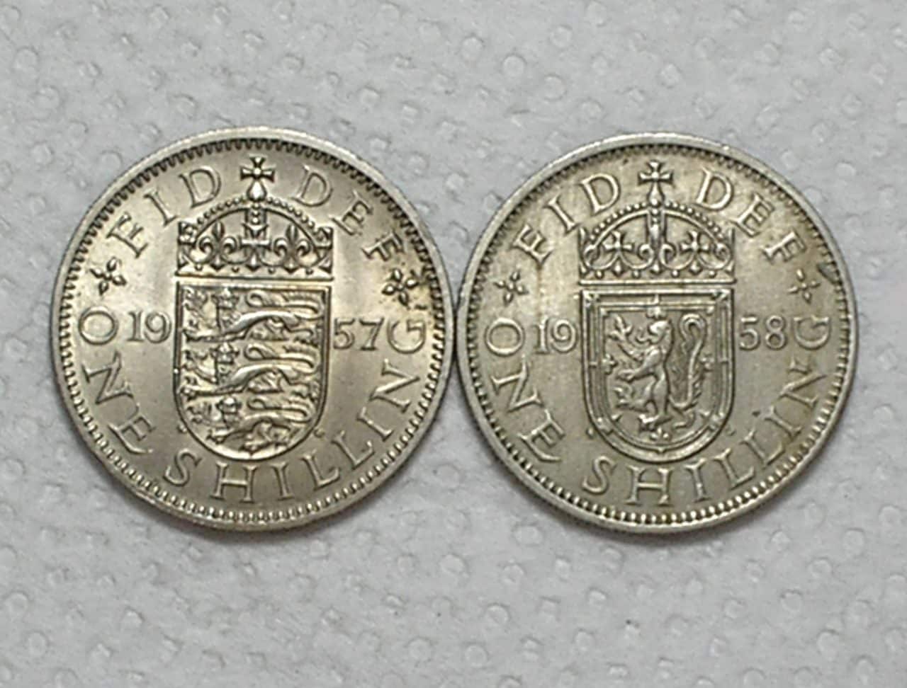 | Casa do Colecionador Inglaterra) 1 Shilling -1957 / 1958 / English e Scottish - Elizabeth II / 23,5mm / Co/Ni / Mbc/S / box56