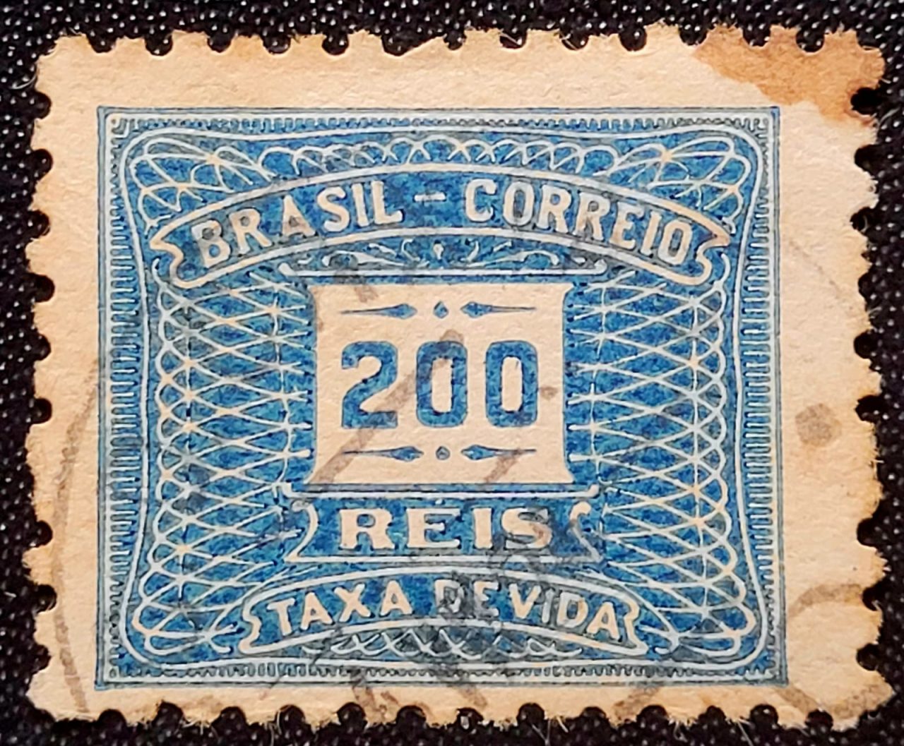 | Casa do Colecionador Taxa Devida - RHM X45 E (Usado) 200 Réis - Tipo Cifra Horizontal - 1922/1924