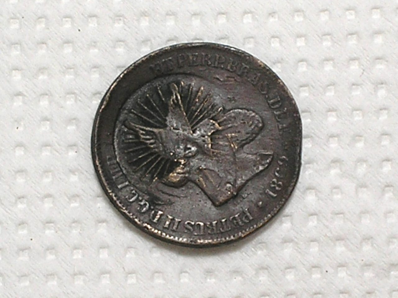 | Casa do Colecionador 10 Réis - 1869 / Carimbo do Divino - a pomba voando / Bronze - Império Petrus II / Mbc / m470