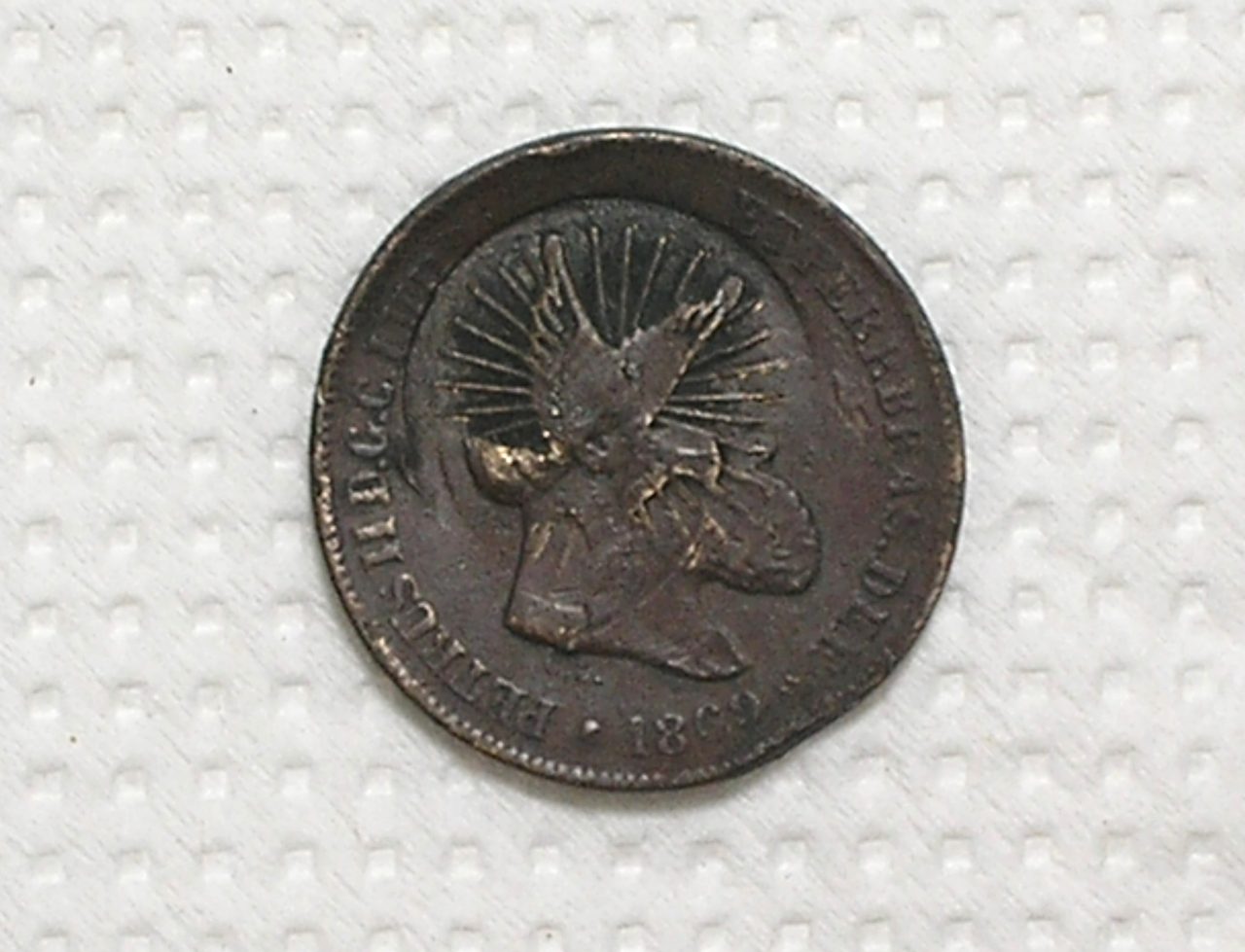 | Casa do Colecionador 10 Réis - 1869 / Carimbo do Divino - a pomba voando / Bronze - Império Petrus II / Mbc / m470