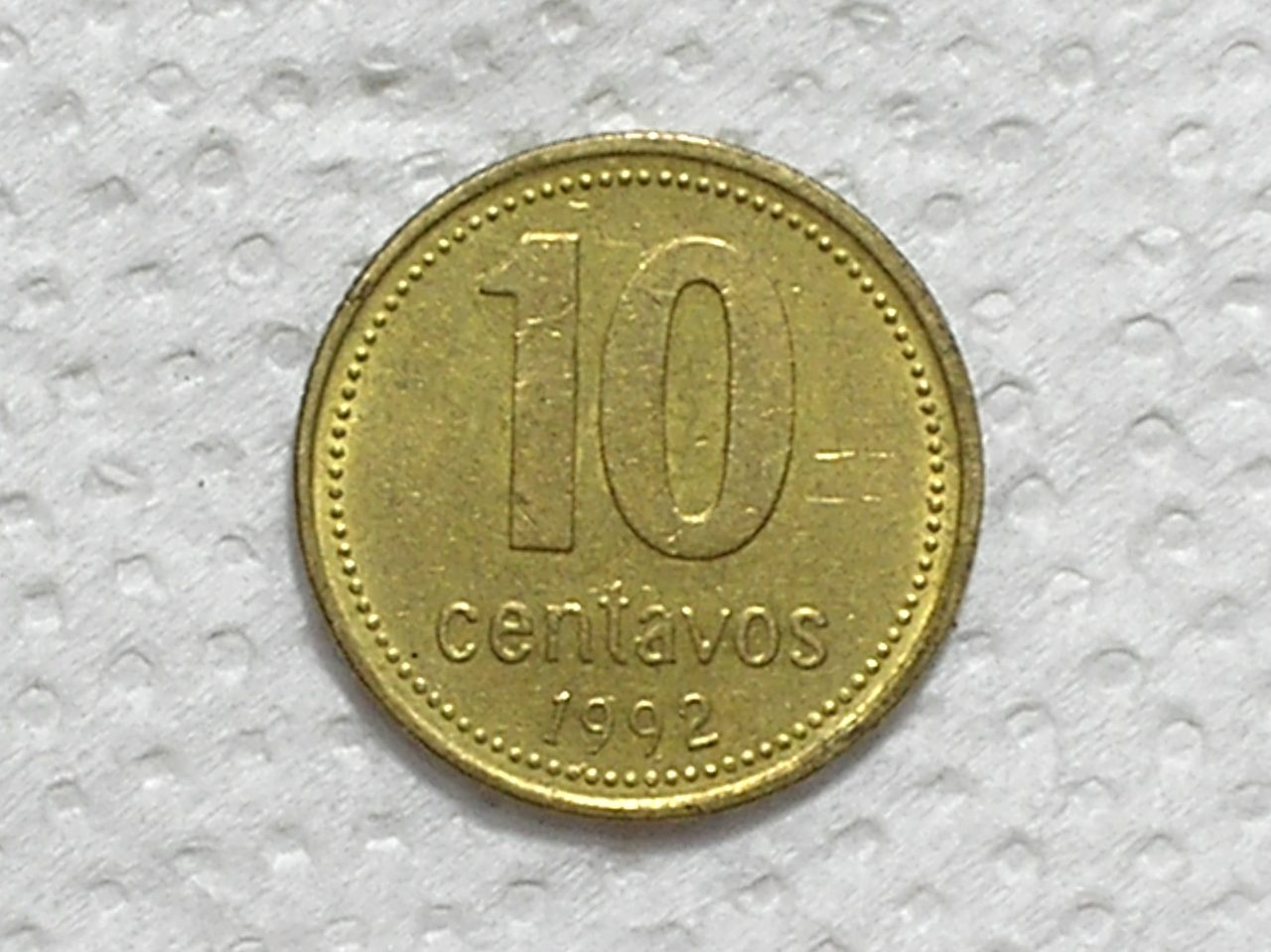 | Casa do Colecionador Argentina) 10 Centavos - 1992 / Carimbo Piratini / Fc / Bz-Al / box57.3