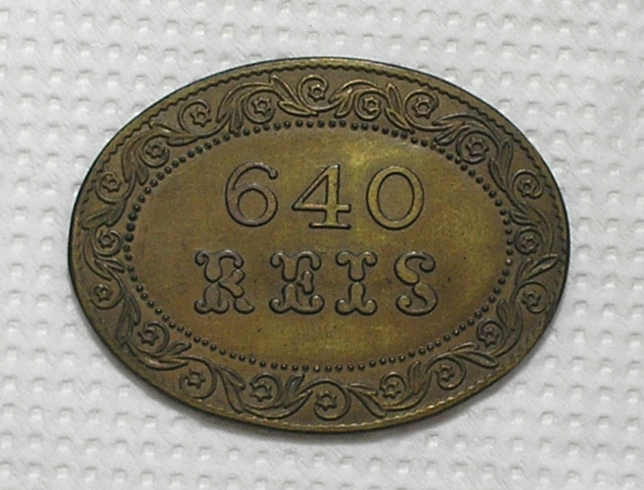 | Casa do Colecionador Ficha 640 Réis da Companhia Nictheroi Inhomirim / Meados de 1855 / Bronze / Mbc / Raríssima / m470