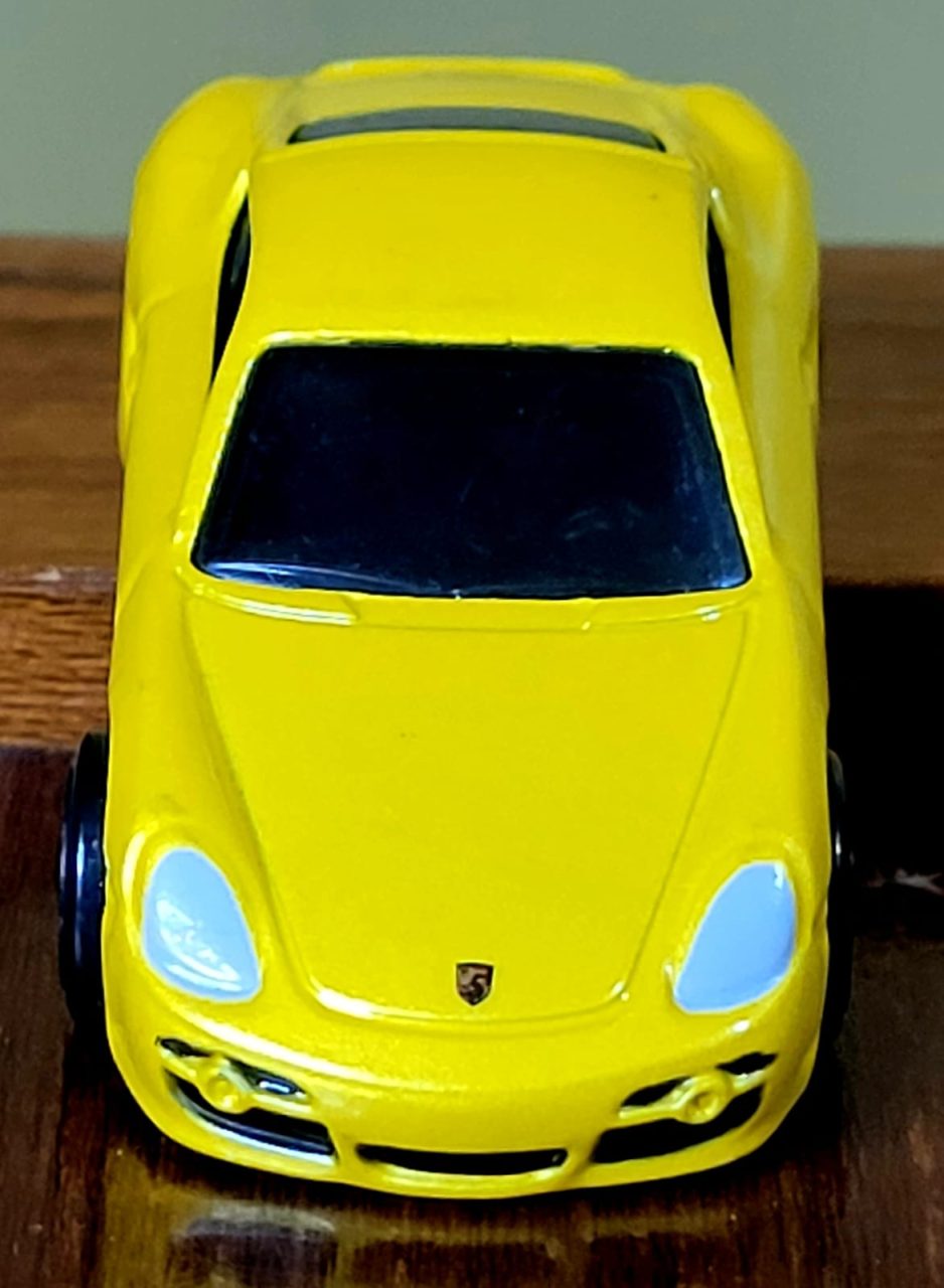 | Casa do Colecionador Hot Wheels Porsche Cayman S Amarelo (1ª Edição) Ano 2008