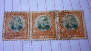 SELO TIRA 100 RÉIS COM CARIMBO EST.CENTRAL LOTE 1289 .