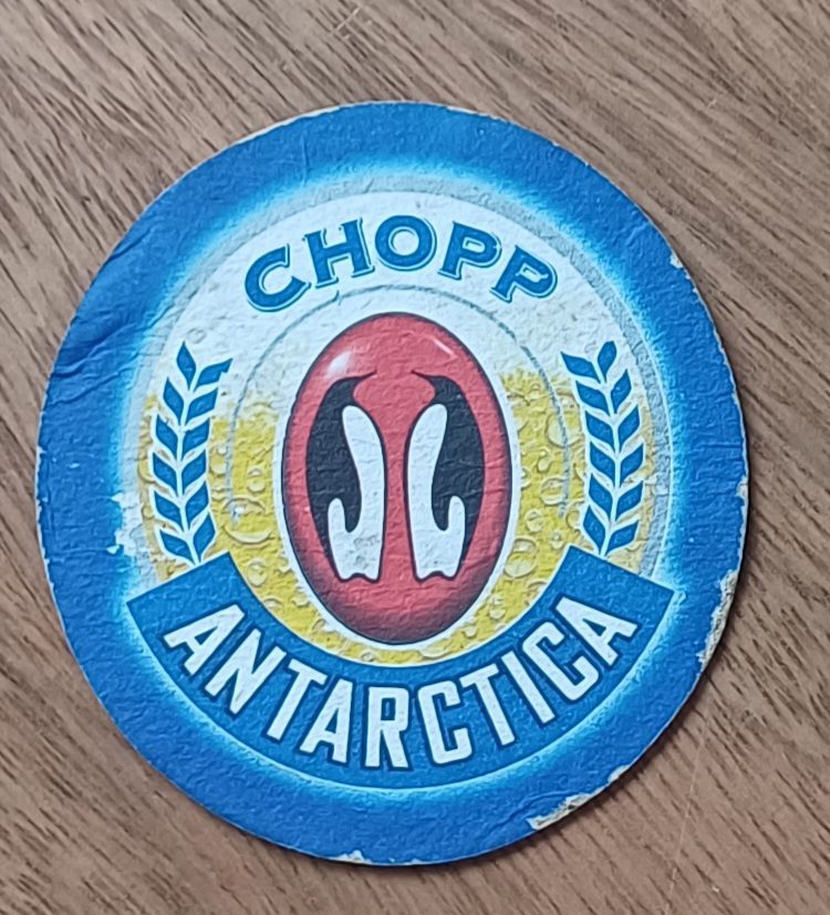 | Casa do Colecionador 5b1. Bolacha de chopp Antarctica. Azul.
