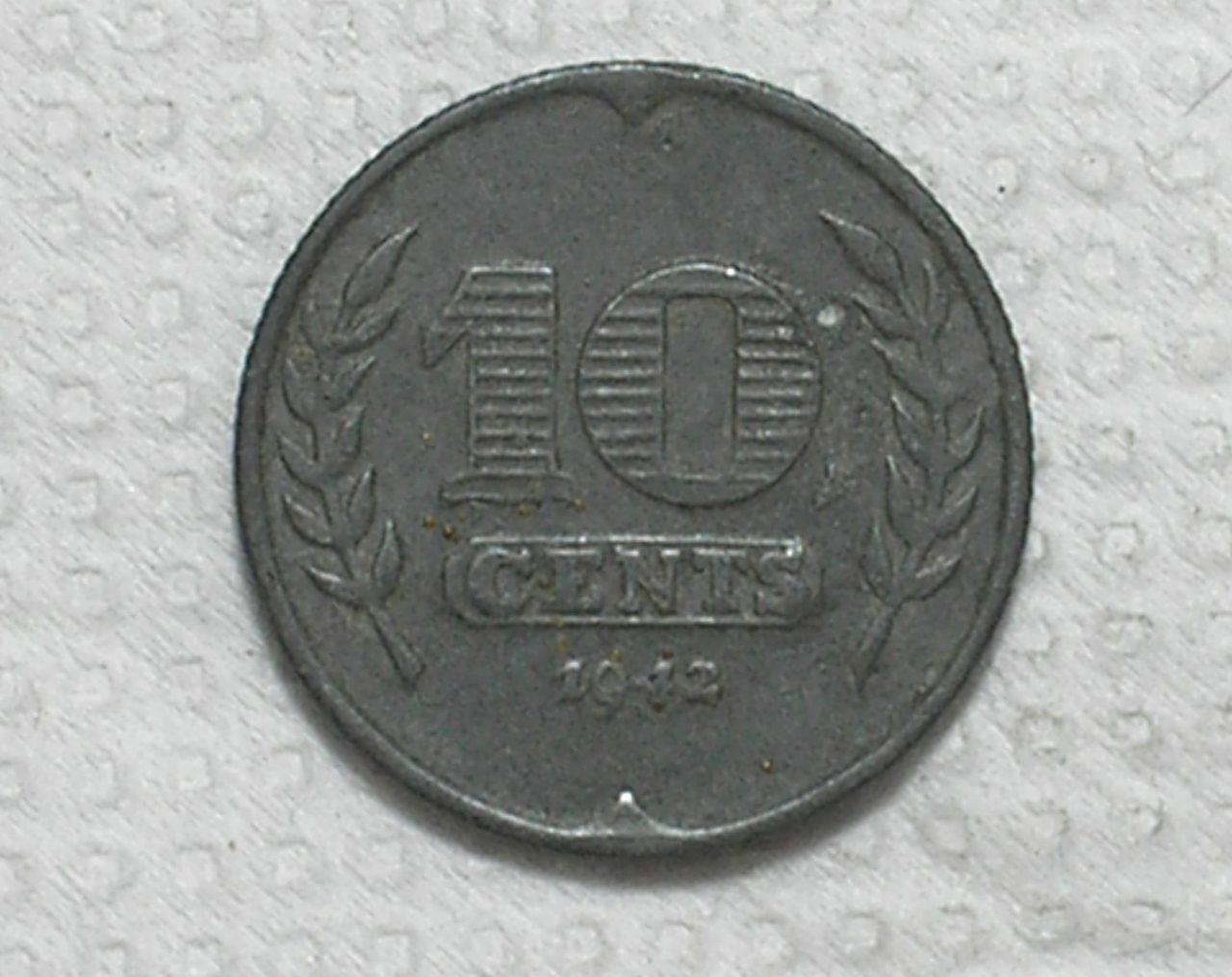 | Casa do Colecionador Holanda) 10 Cents - 1942 / 2ª Guerra / 22mm / Mbc / Zinco / box61