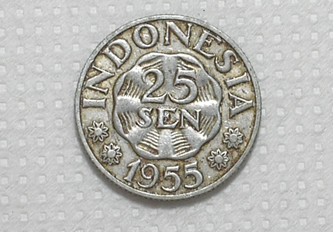 | Casa do Colecionador Indonesia) 25 Sen - 1955 / 27.7mm / Al / box61