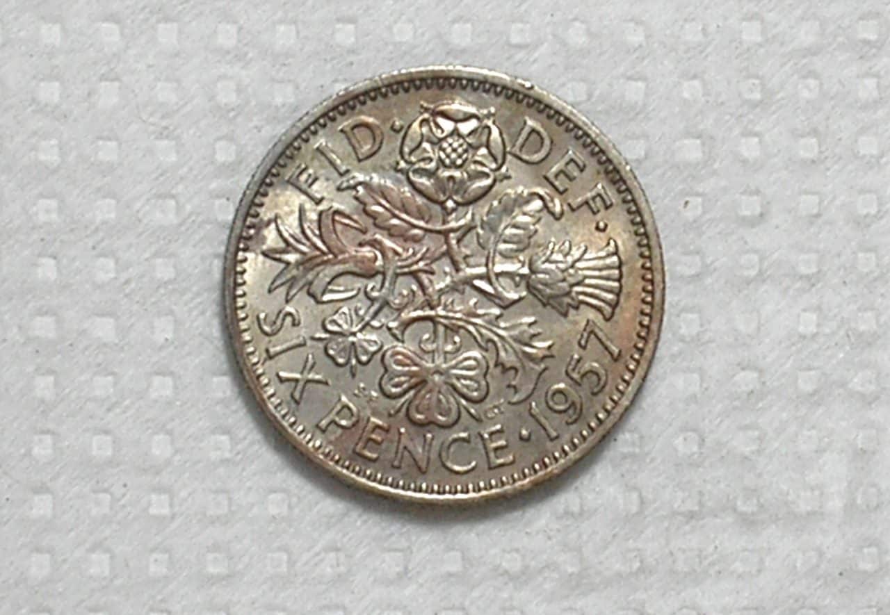| Casa do Colecionador Inglaterra) 6 Pence - 1957 / 19,5mm / Sob / Co/Ni / box61
