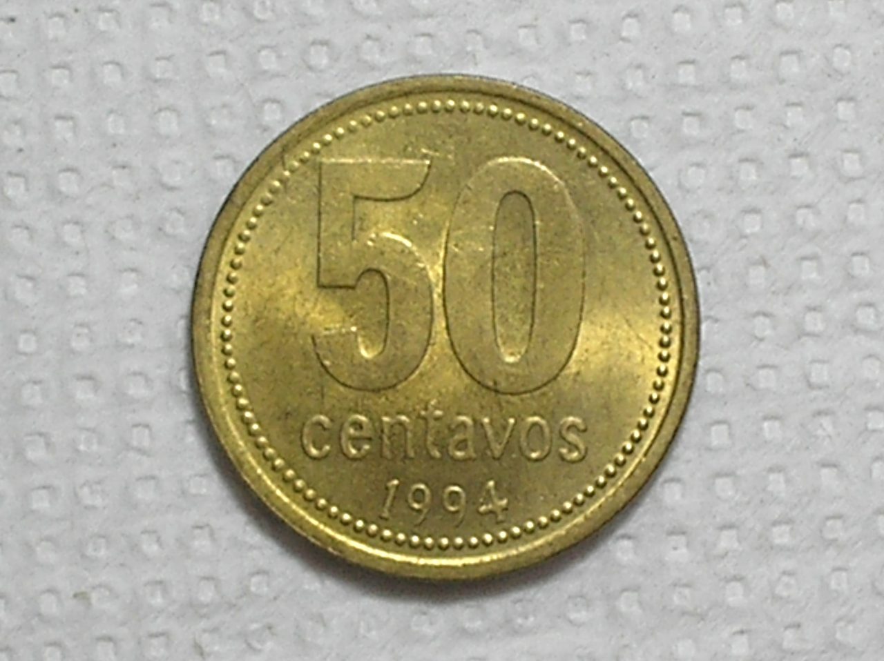 | Casa do Colecionador Argntina) 50 Centavos - 1994 / 24mm / S/Fc / Bz/al / box64