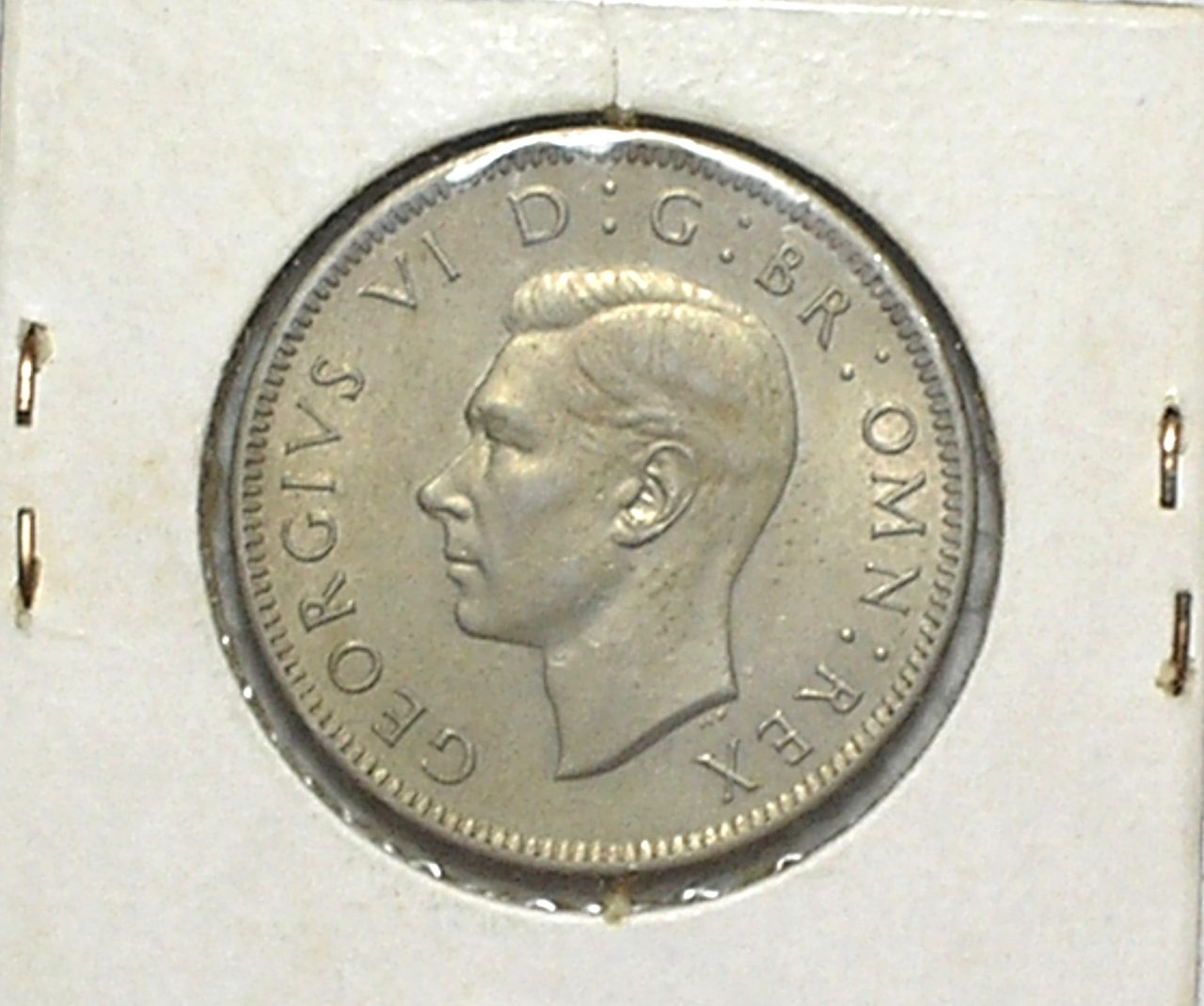 | Casa do Colecionador Inglaterra) 1 Shilling - 1948 / Georgivs VI / Flor de Cunho / English crest - Leão em pé / Co/Ni / m520