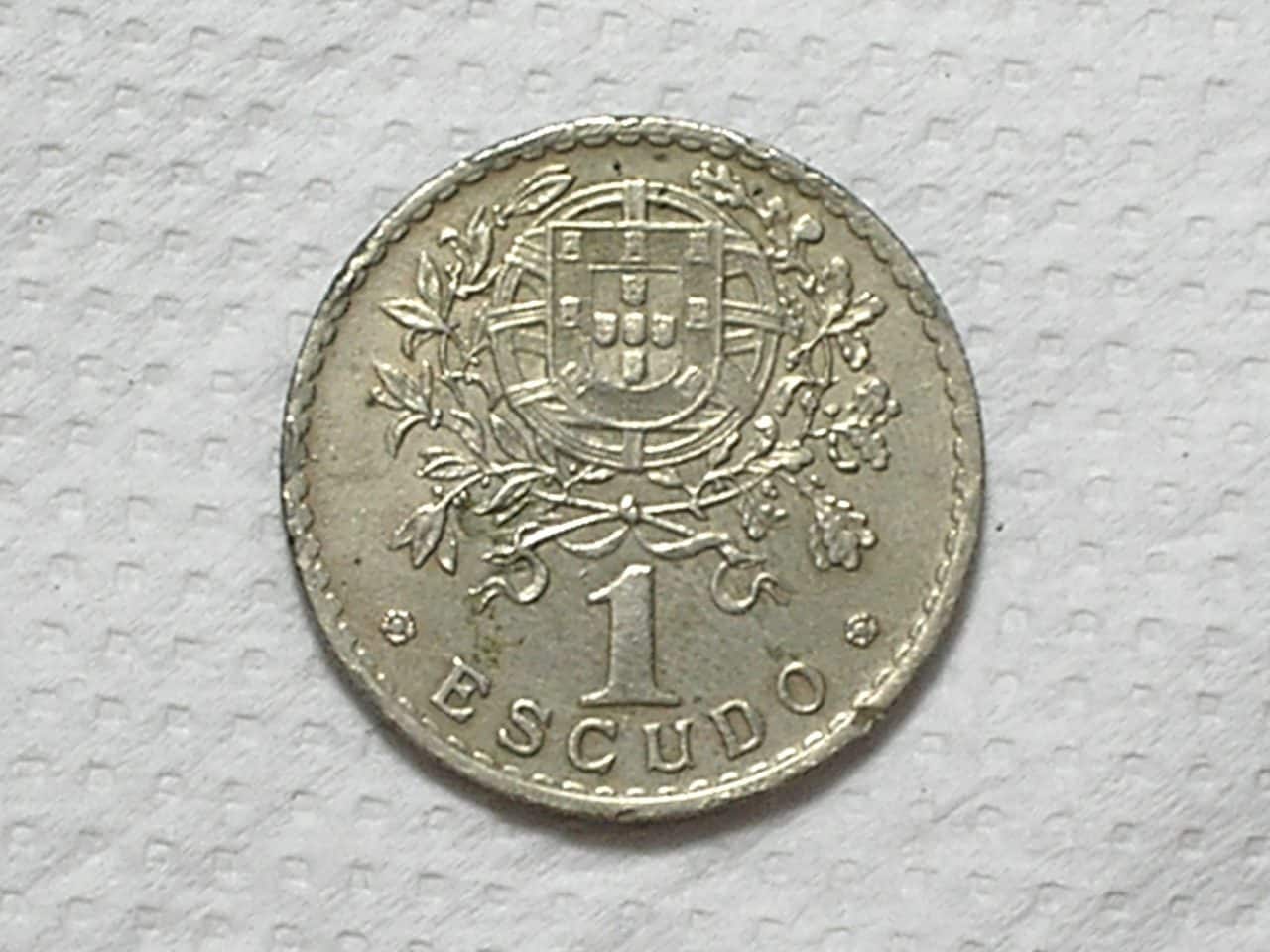 | Casa do Colecionador Portugal) 1 Escudo - 1931 / Escassa / 26,5mm / Co/Ni / box63.1