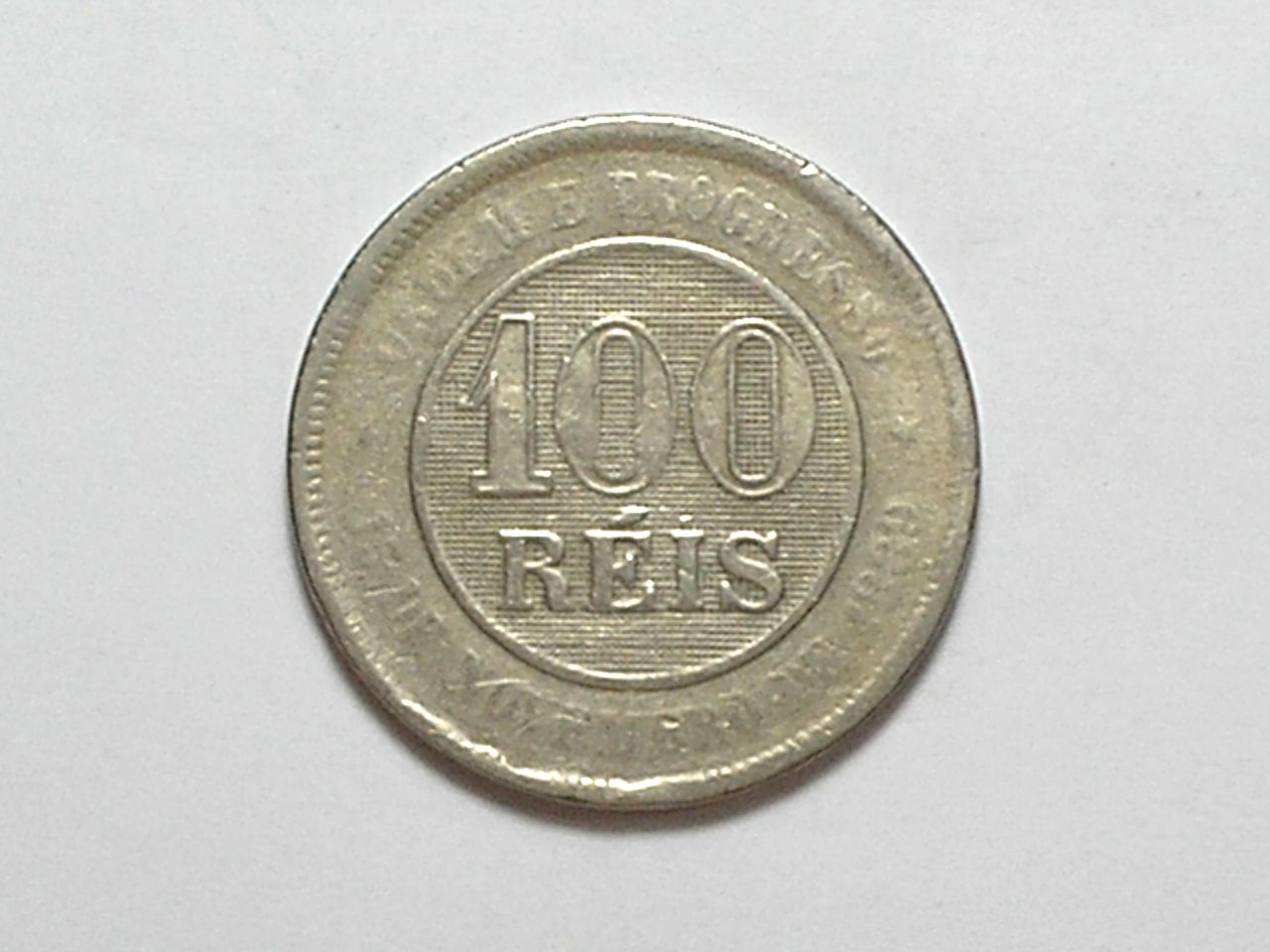 | Casa do Colecionador 100 Réis - 1889 - Cunho raso e rachado - República / Níquel / Mbc