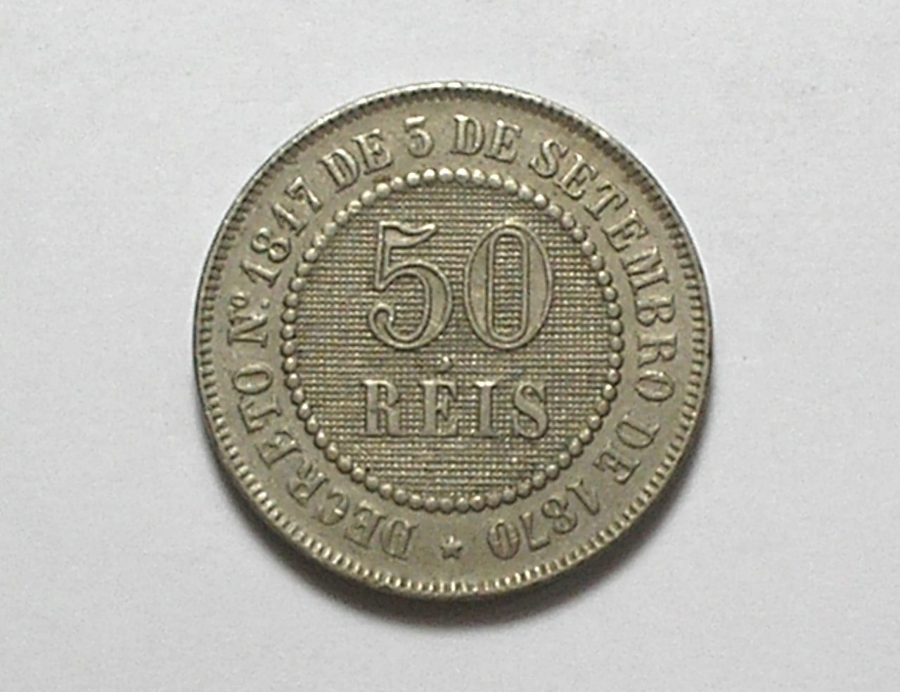 | Casa do Colecionador 50 Réis - 1886 / Fundo Linhado / Flor de cunho - raro no estado / Níquel