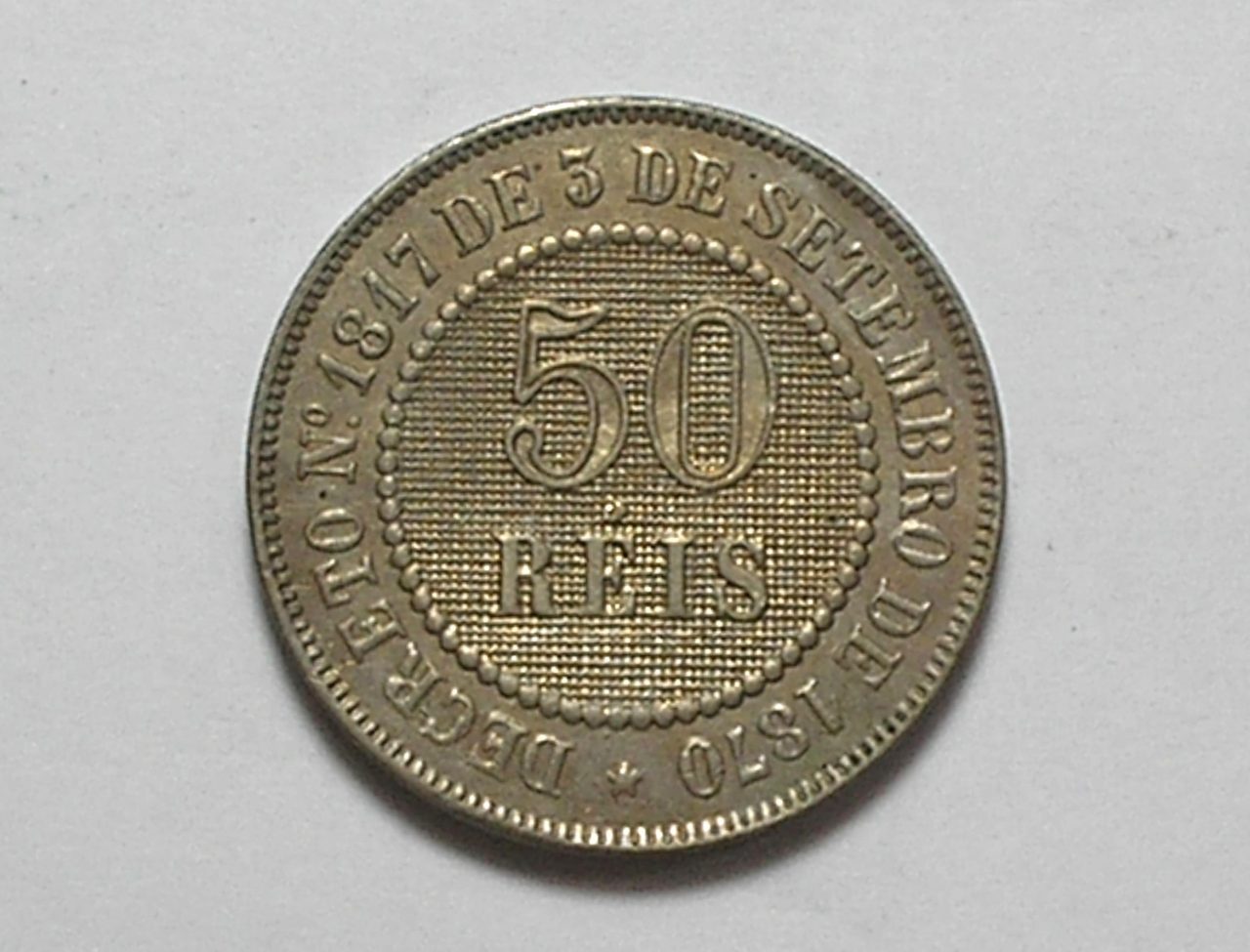 | Casa do Colecionador 50 Réis - 1886 / Fundo Linhado / Flor de cunho - raro no estado / Níquel