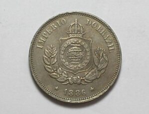 50 Réis - 1886 / Fundo Linhado / Flor de cunho - raro no estado / Níquel