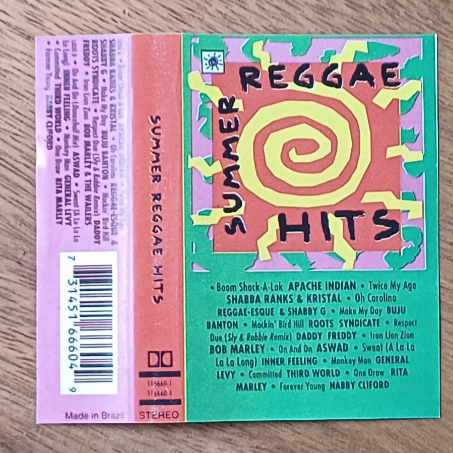 | Casa do Colecionador 25ma. Capa da fita k7 Summer Reggae hits, sem a fita.