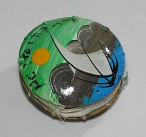 Porta Niquel ou moedas Artesanal Pintado e confeccionado com Casca de Coco