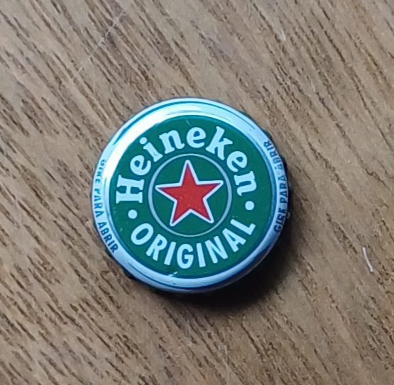 | Casa do Colecionador Embalagem tampinha cerveja Heineken original verde.