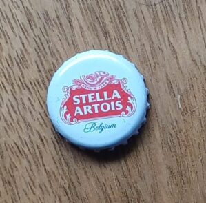 Embalagem tampinha cerveja Stella Artois belgium branca.