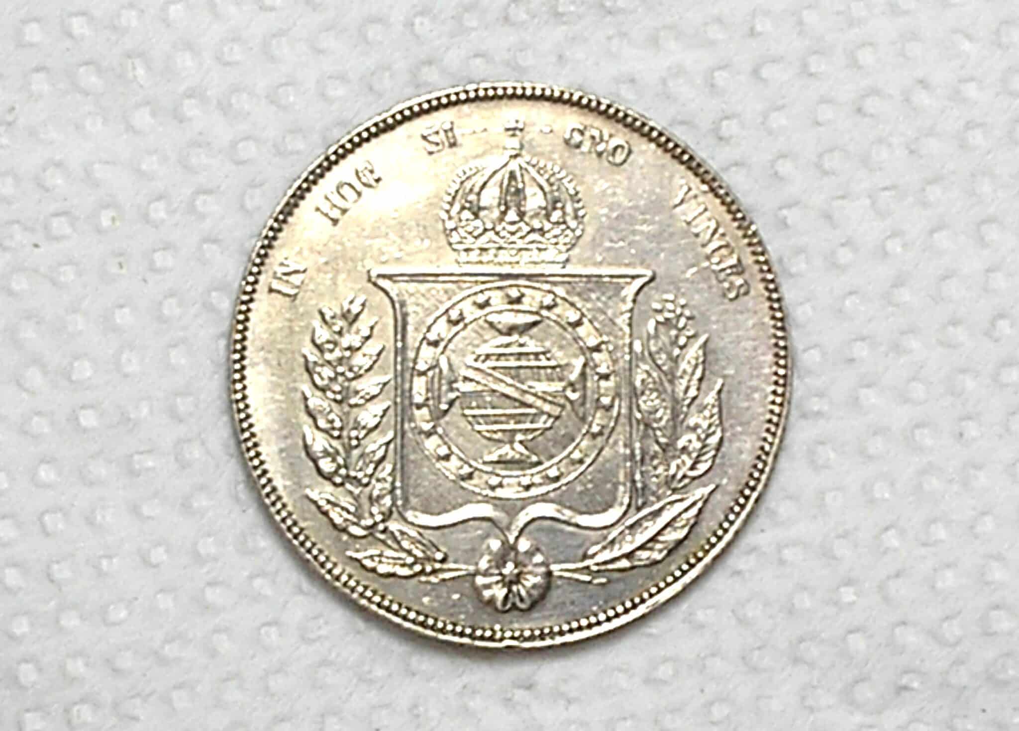 | Casa do Colecionador 1.000 Réis - 1856 / Ponto Entre Zeros / Data, 6 Não Emendado e deslocado pra cima / Império / Sob/Flor / Prata / Cod.Alb