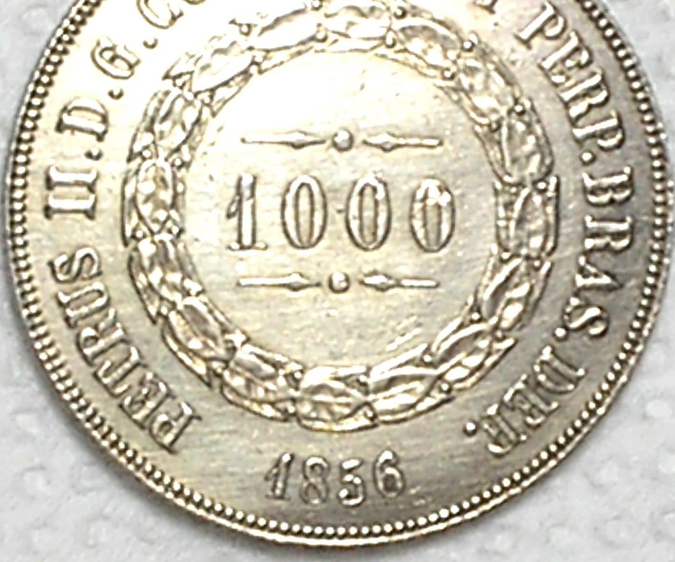 | Casa do Colecionador 1.000 Réis - 1856 / Ponto Entre Zeros / Data, 6 Não Emendado e deslocado pra cima / Império / Sob/Flor / Prata / Cod.Alb