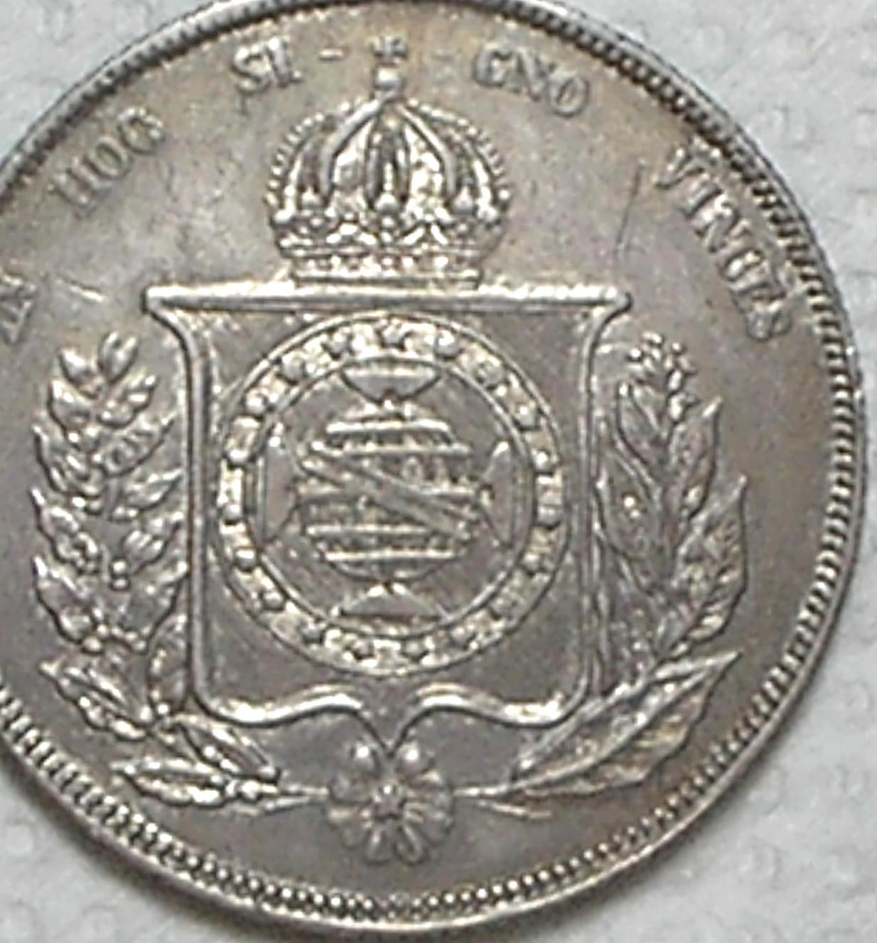 | Casa do Colecionador 1.000 Réis – 1854 / Esfera Armilar e Galho Esquerdo Duplo / Mbc/Sob / Prata / cod.450.1