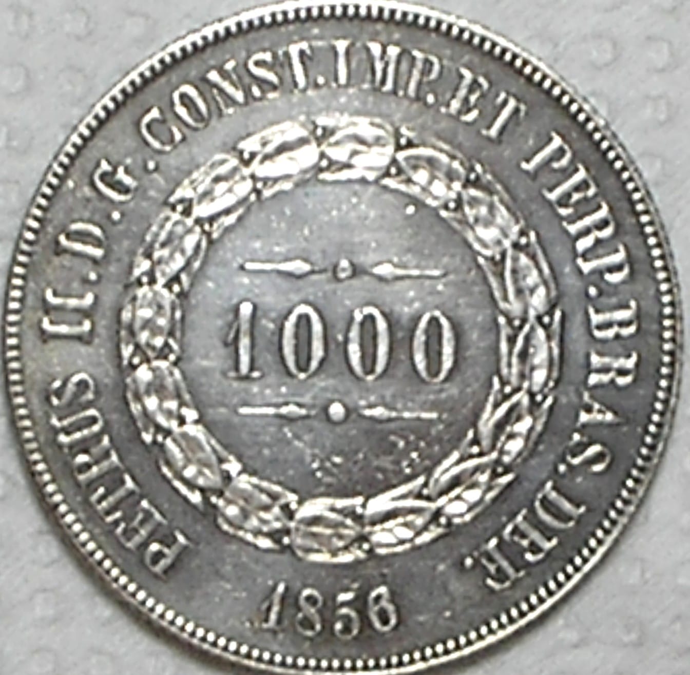| Casa do Colecionador 1.000 Réis – 1856 / Ponto Entre Zeros / Data Emendada / Soberba / Prata / cod.450.2