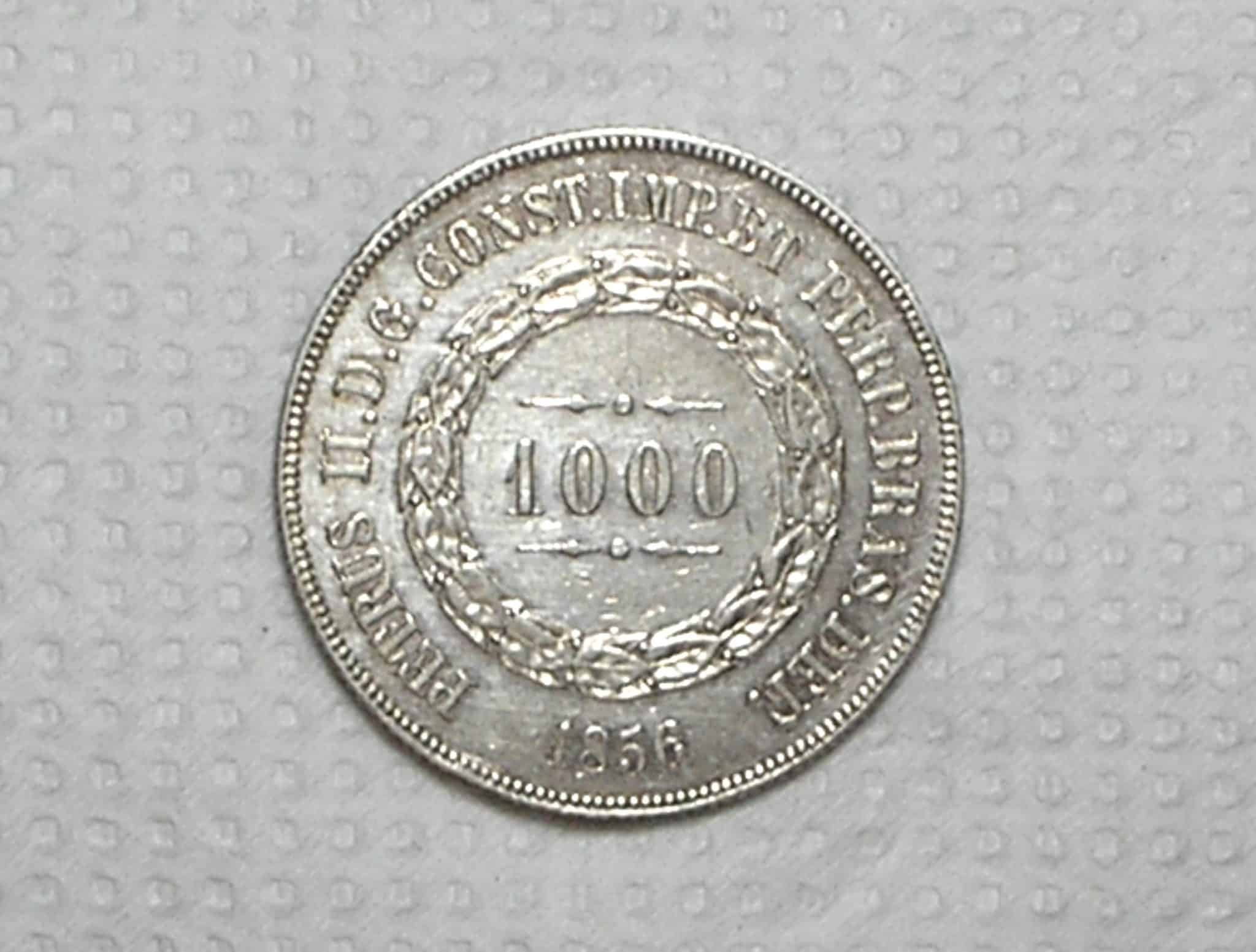 | Casa do Colecionador 1.000 Réis – 1856 / Ponto Entre Zeros / Data não emendada / Soberba / Prata / cod.450.1