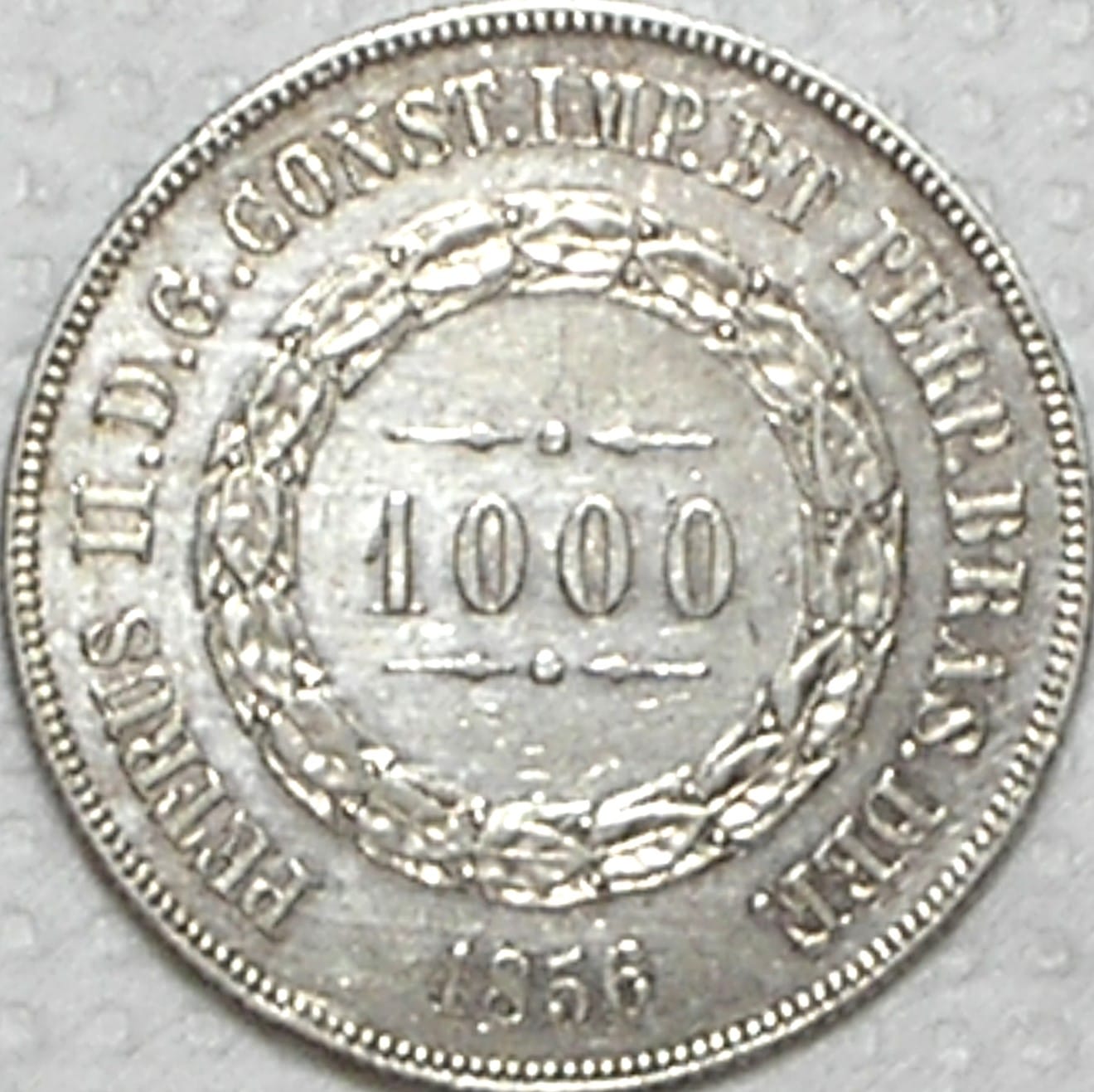 | Casa do Colecionador 1.000 Réis – 1856 / Ponto Entre Zeros / Data não emendada / Soberba / Prata / cod.450.1