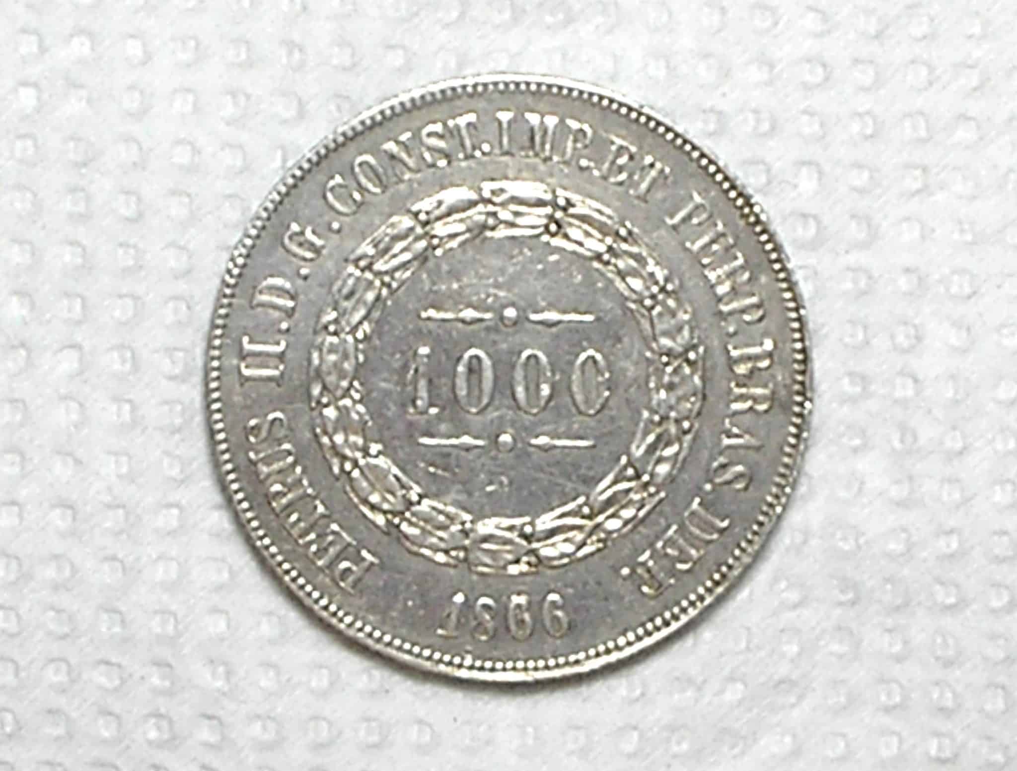 | Casa do Colecionador 1.000 Réis – 1866 / Data, 1º 6 Duplo / Soberba / Variante rara / Prata / cod.450