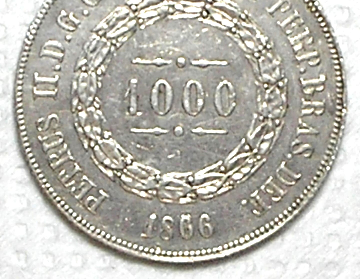 | Casa do Colecionador 1.000 Réis – 1866 / Data, 1º 6 Duplo / Soberba / Variante rara / Prata / cod.450