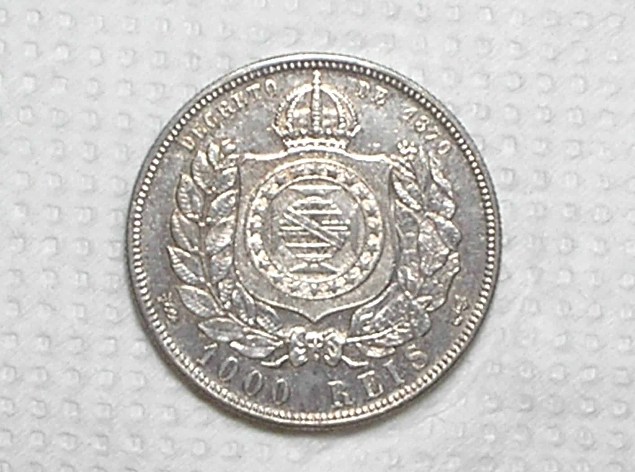 | Casa do Colecionador 1.000 Réis – 1884 / Cabeça de Petrus 2º / Sob/Flor / Prata / cod.450