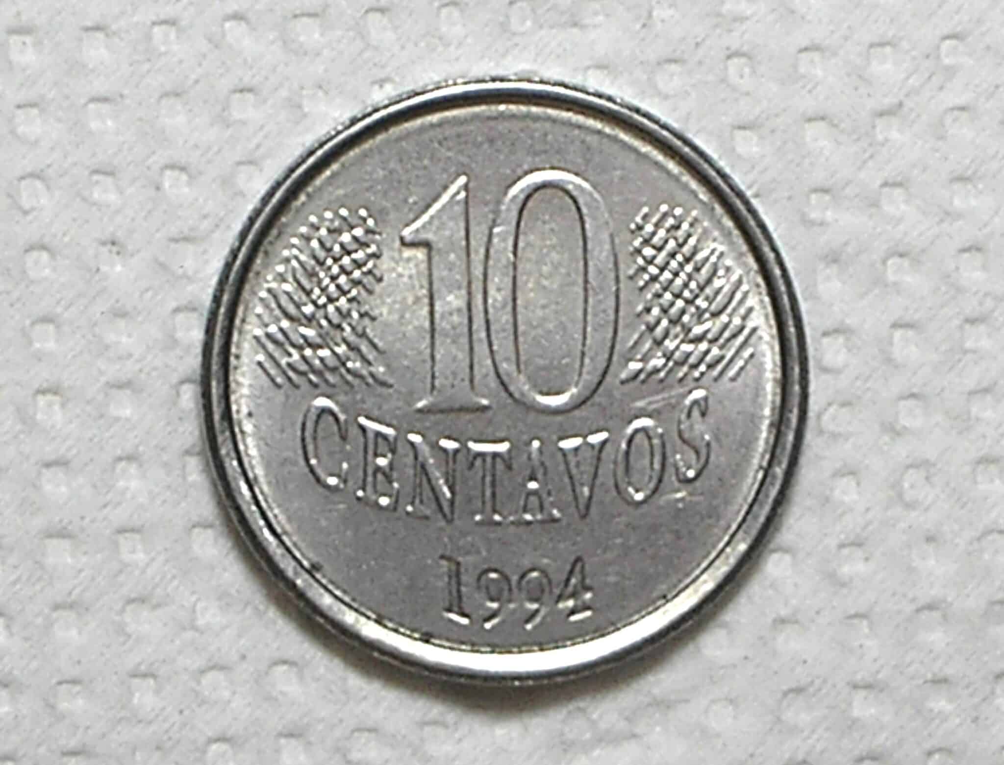 | Casa do Colecionador 10 Centavos - 1994 / Reverso Invertido / Sob/Flor / Escassa / Alb.Rev.