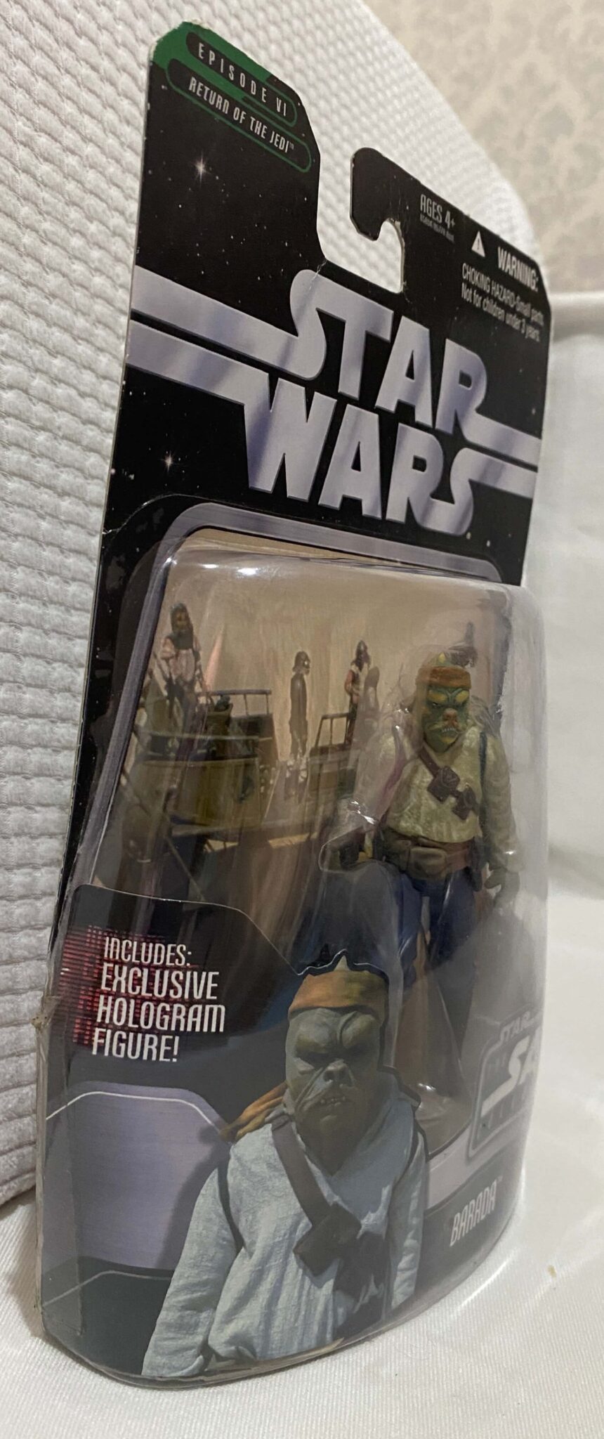 | Casa do Colecionador Barada - The Saga Collection - Battle of Carkoon – 2006 – Holo Boba Fett