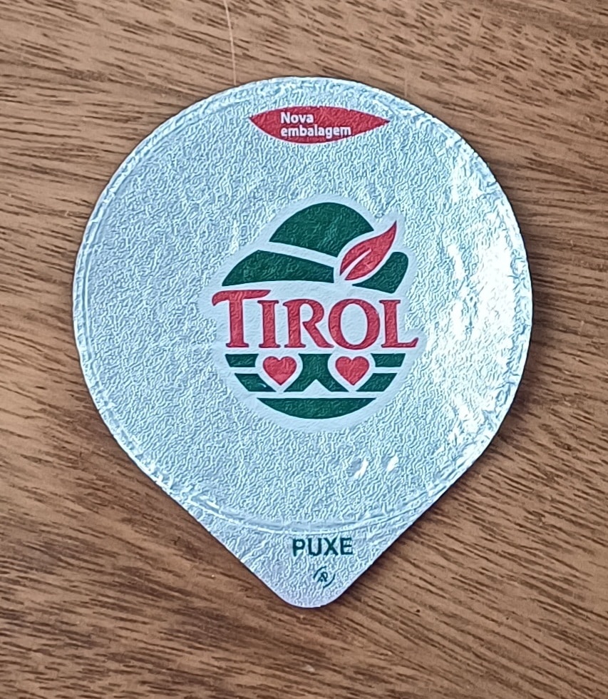 | Casa do Colecionador Embalagem tampa lacre. Alimentos Tirol nova.