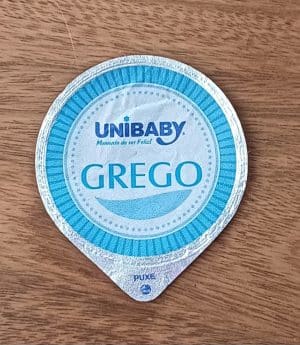 Embalagem tampa lacre. Alimentos Unibaby Grego.