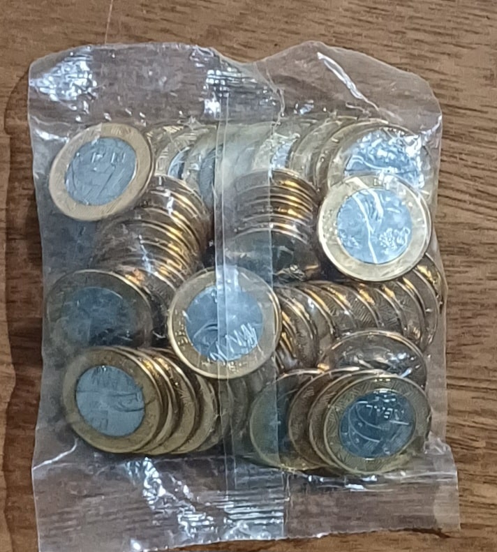| Casa do Colecionador Sache com 50 moedas de 1 real Olimpíadas Basquetebol.