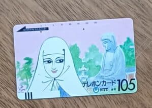 Ccte. Cartão telefone Japão Ntt 250. Figura feminina e Buda ao fundo.