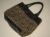 Bolsa Feminina Casual were da marca Tommy Hilfiger acabamento em couro e napa – Nova – Alt.25 x Lar. 30 cent